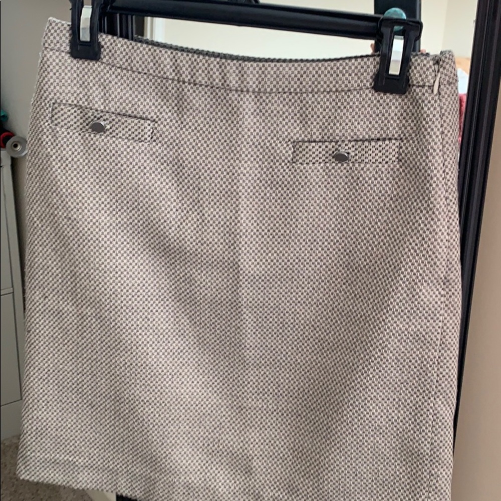Loft knee length cream skirt. Size 0